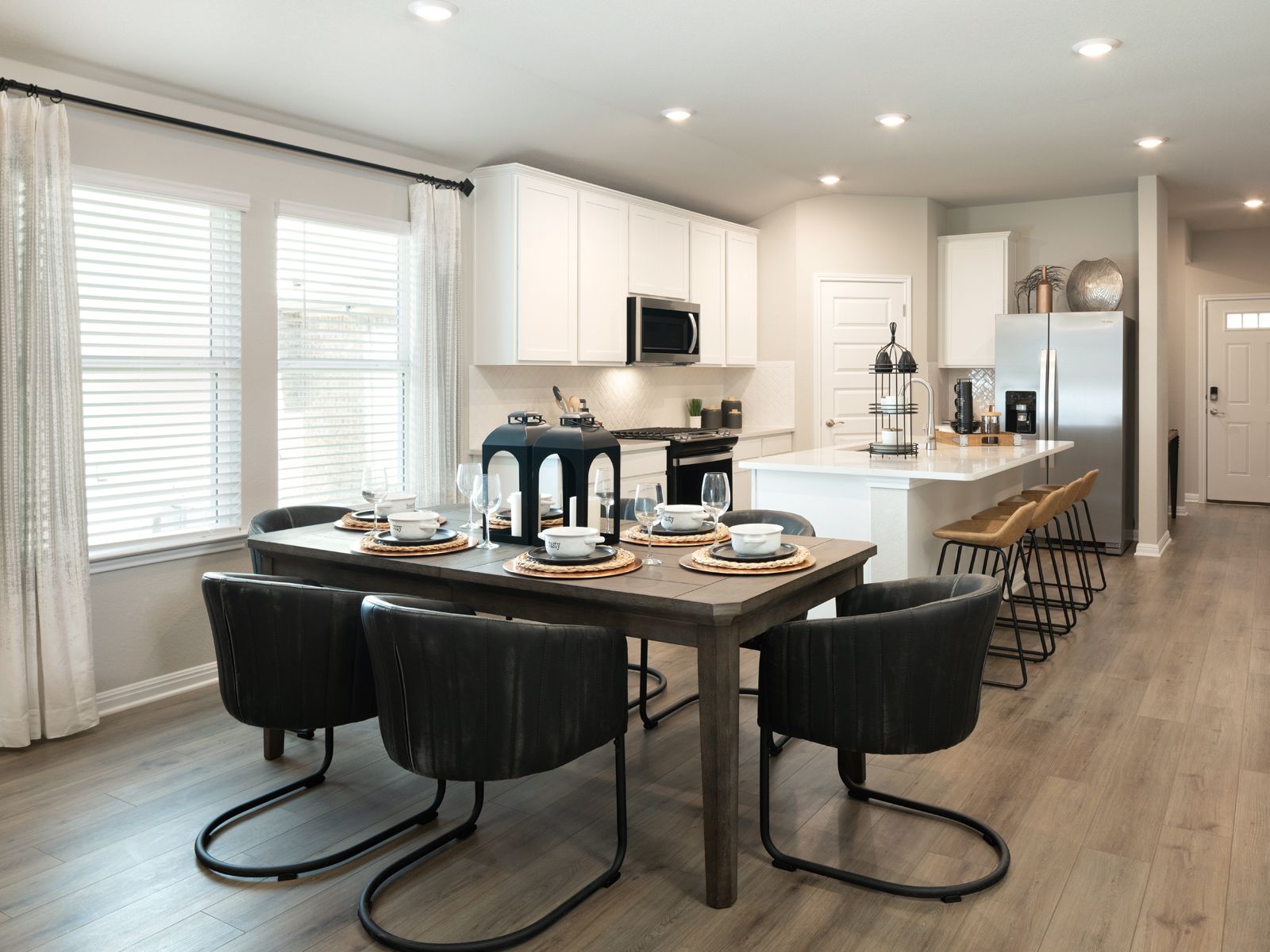 This floorplan features modern open-concept living and dining spaces.