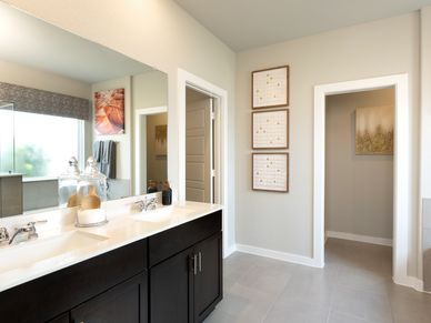 Unwind after a long day in your primary bathroom