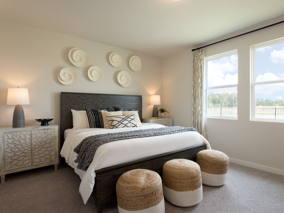 Relax in your primary suite oasis.