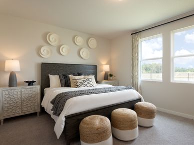 Relax in your primary suite oasis.