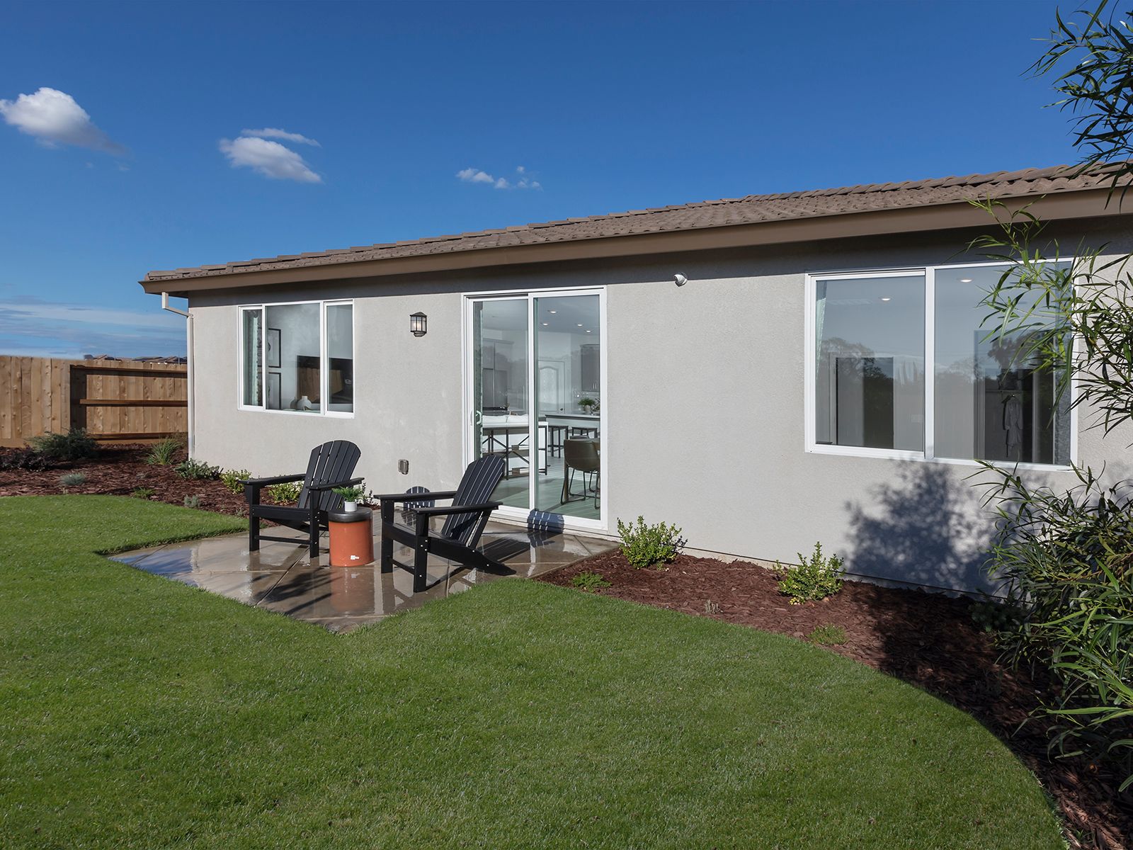 Residence 3 backyard exterior modeled at a nearby Meritage community.