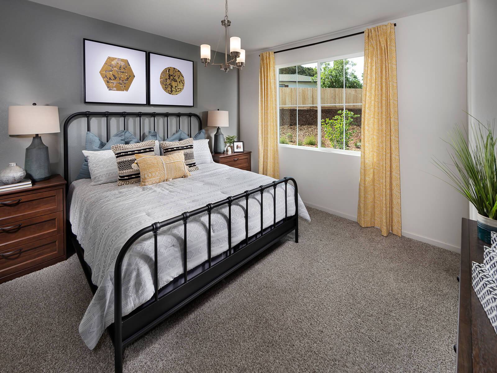 Residence 1 primary suite modeled at a nearby Meritage community.