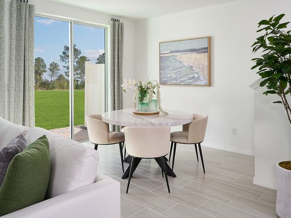 Dining room in the Windsor floorplan at The Meadow at Crossprairie