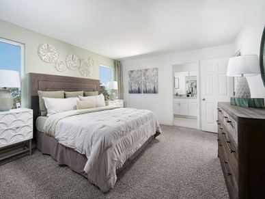 Primary bedroom in the Windsor floorplan at The Meadow at Crossprairie