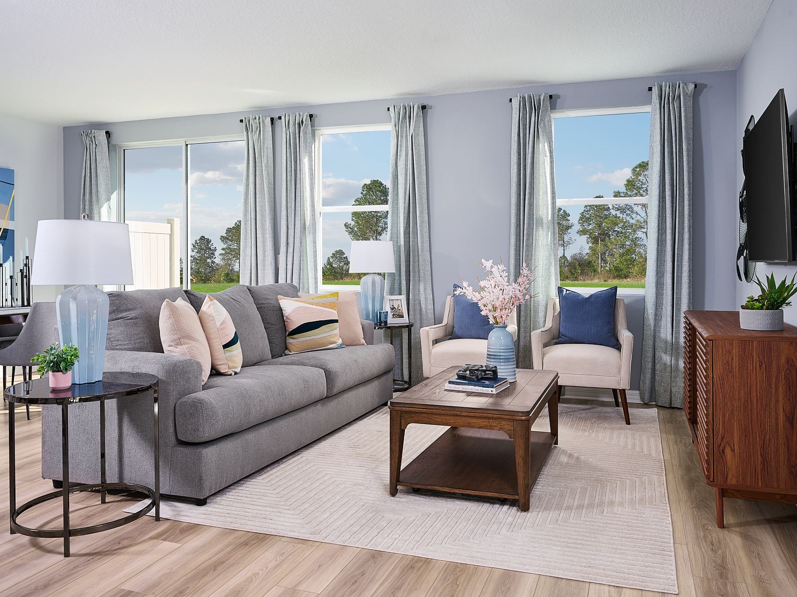 Family room in the Oakville floorplan at The Meadow at Crossprairie