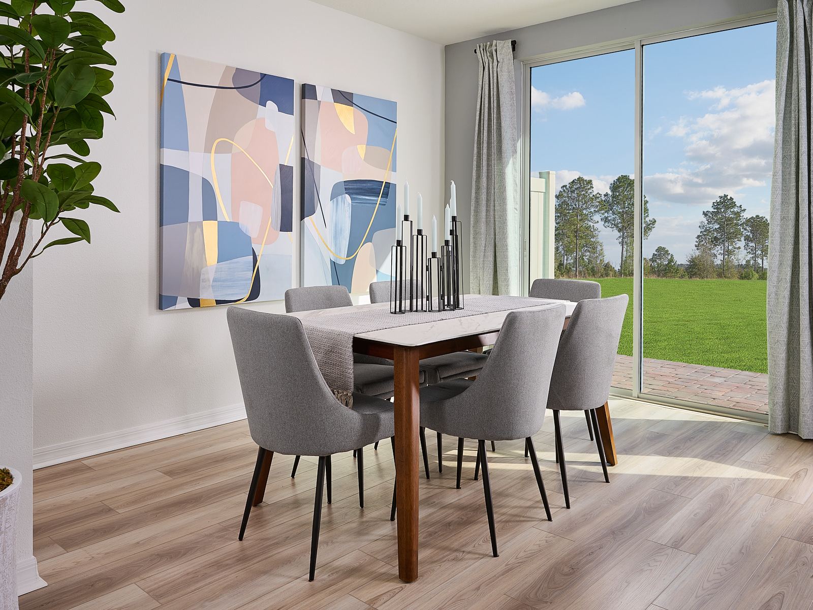 Dining room in the Oakville floorplan at The Meadow at Crossprairie