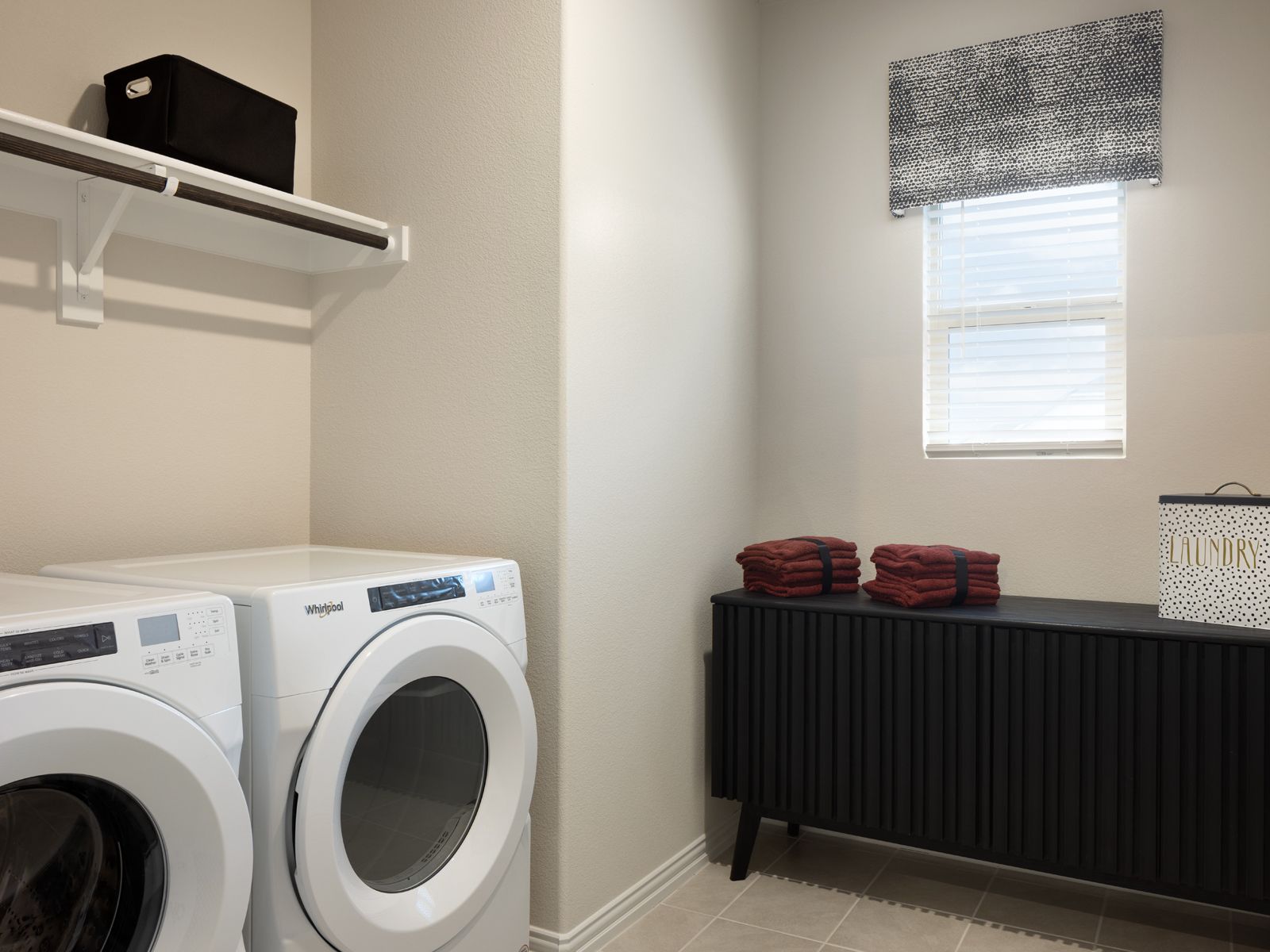 Enjoy the spacious laundry room