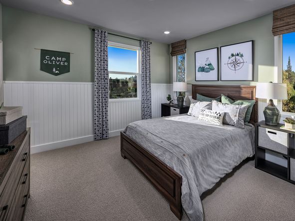Stay close to young children with the secondary bedroom close to the primary suite.