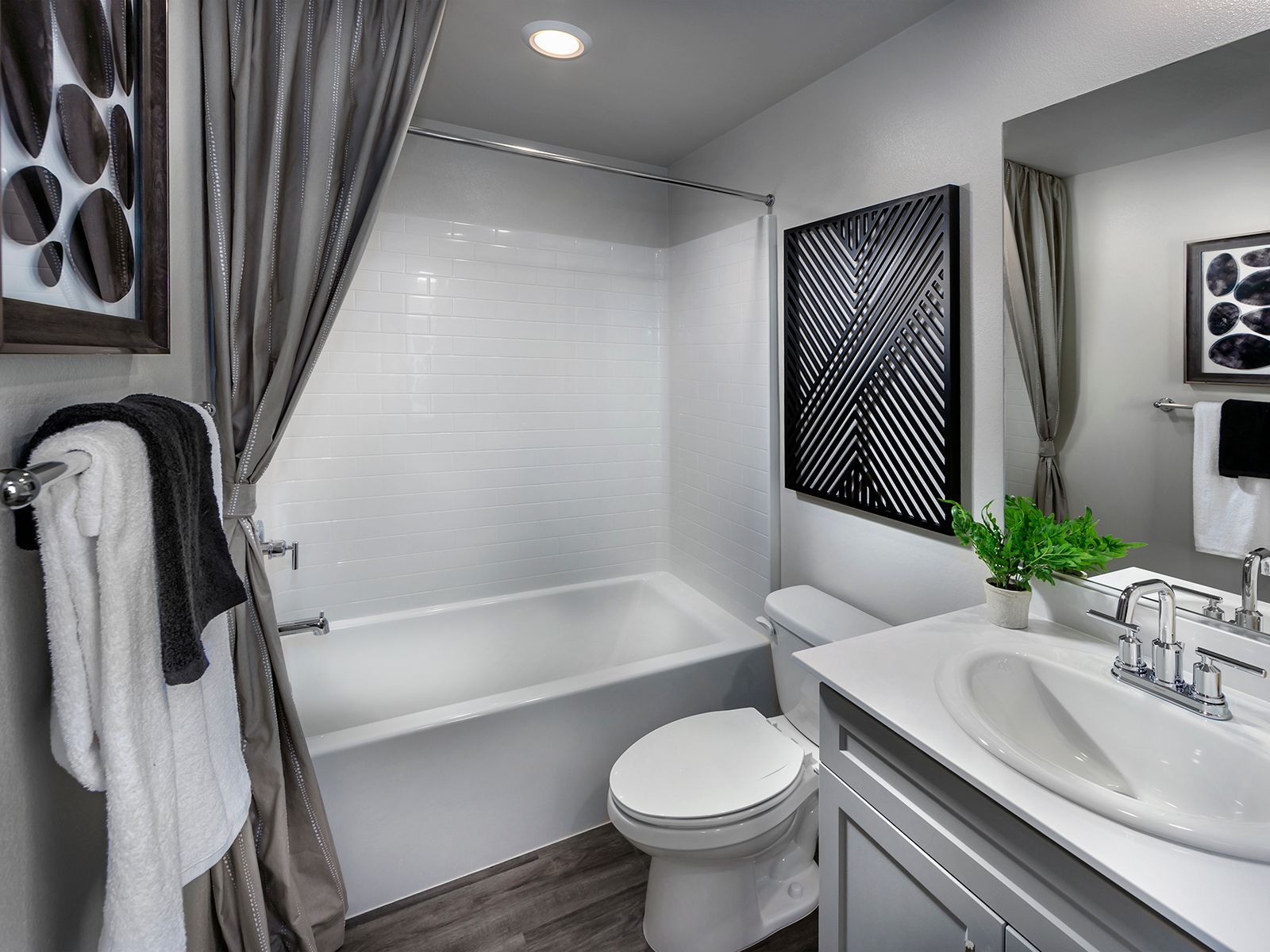 Getting ready is a breeze with a private bathroom for each bedroom.