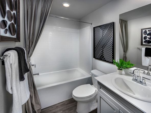Getting ready is a breeze with a private bathroom for each bedroom.