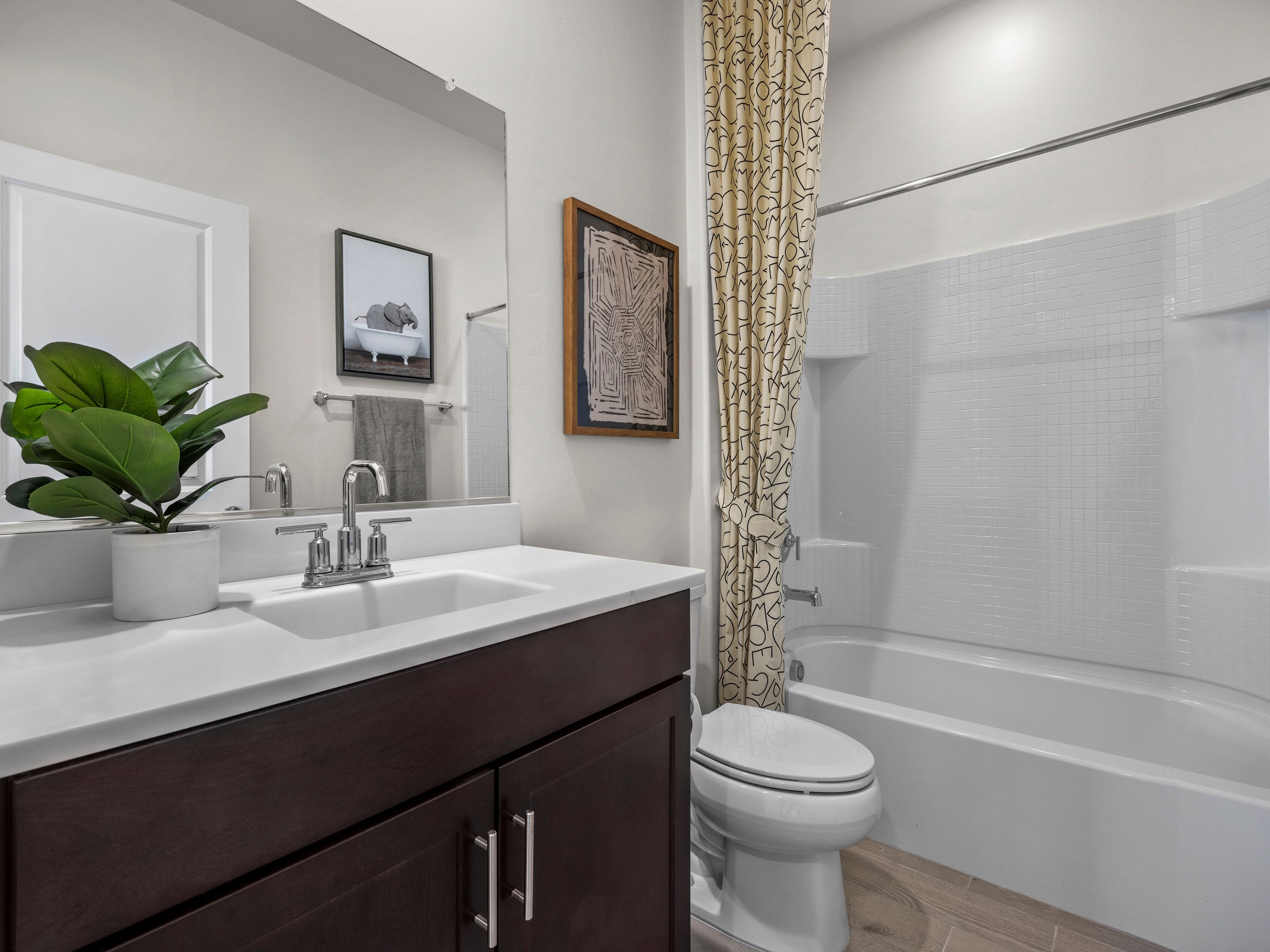 Second bathroom conveniently located between bedrooms two and three.
