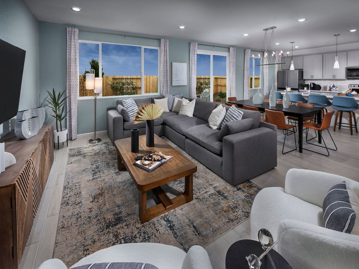 The open-concept living spaces are perfect for hosting friends and family.