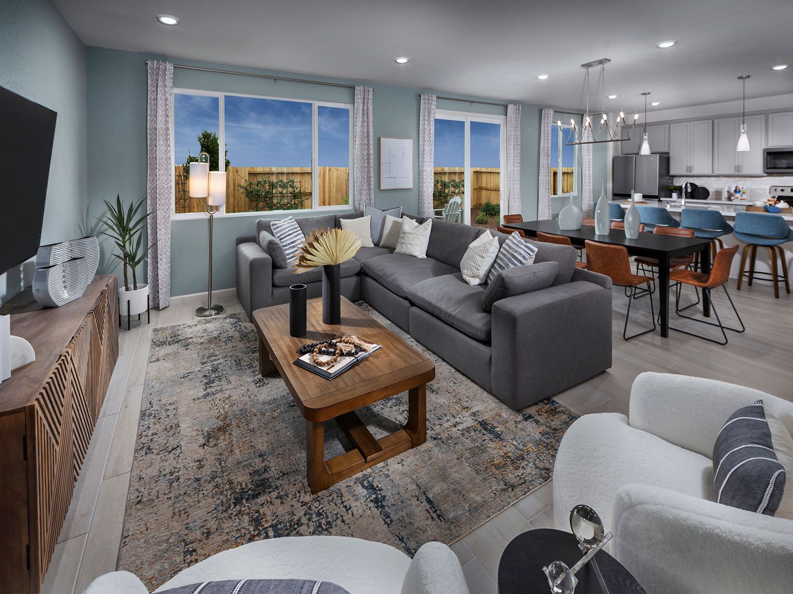 The open-concept living spaces are perfect for hosting friends and family.