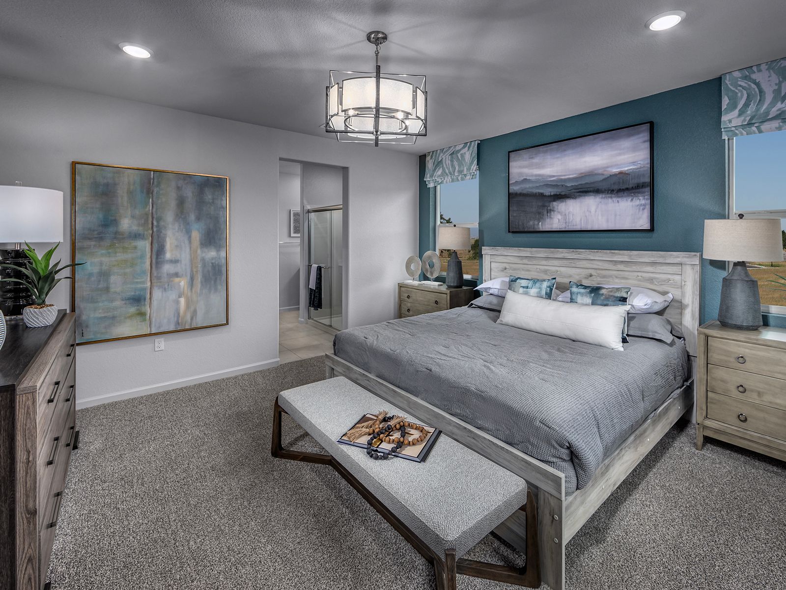 Residence 2 primary bedroom modeled at a nearby Meritage community.