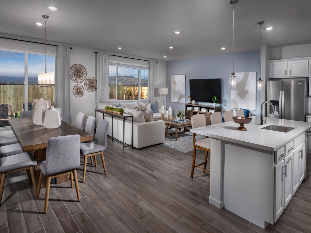 Overlook the living space while making meals or watching TV.