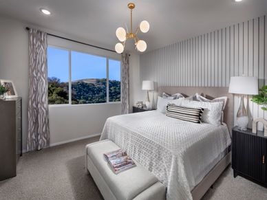 Retreat to the private primary suite to relax and unwind.