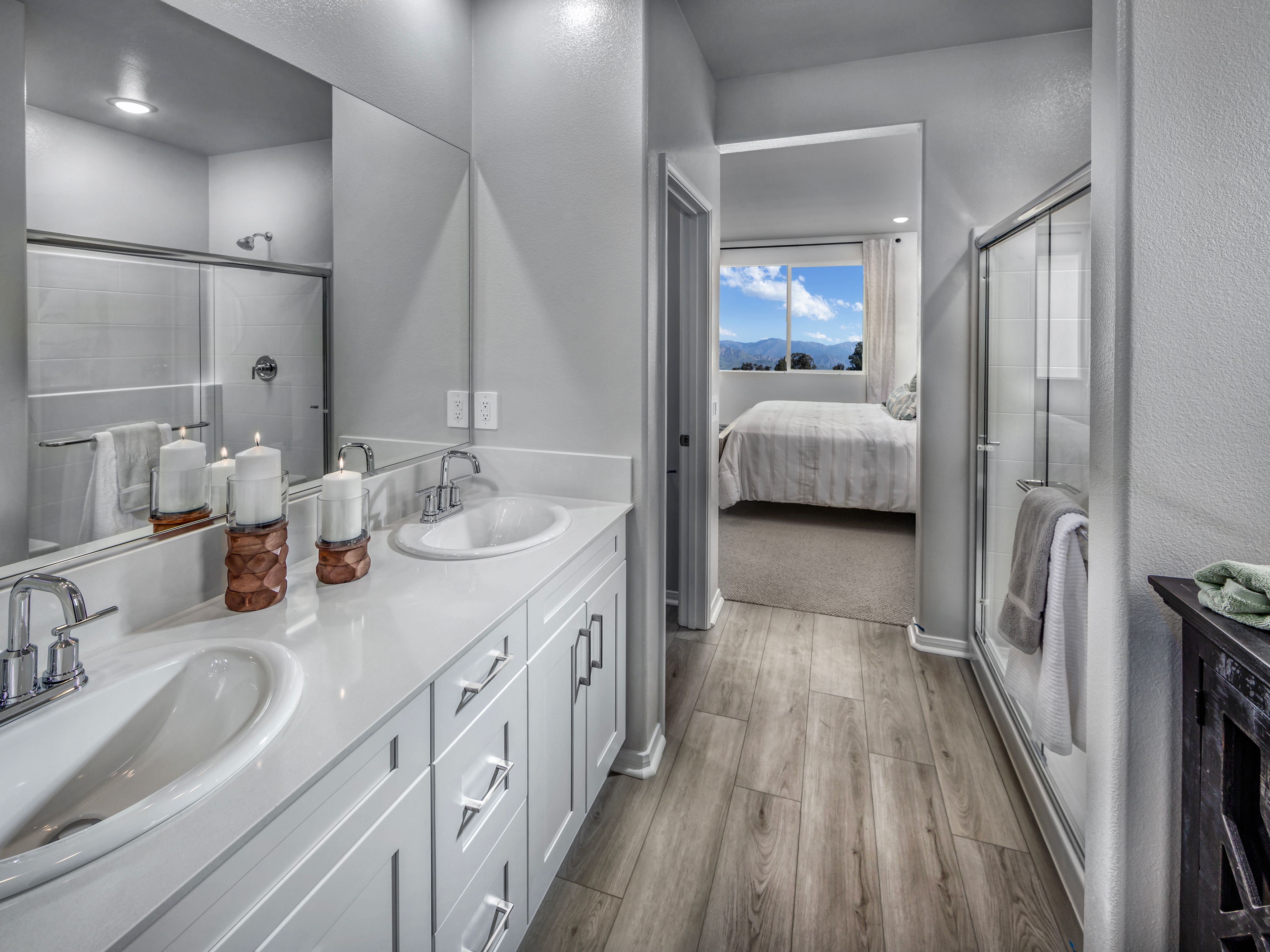 Getting ready is a breeze with duel sinks in the primary bathroom.