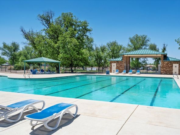 Arbor at Madera Highlands is nestled within mature landscaping and offers several amenities including walking and bike paths, basketball courts, community pool, and neighborhood parks.