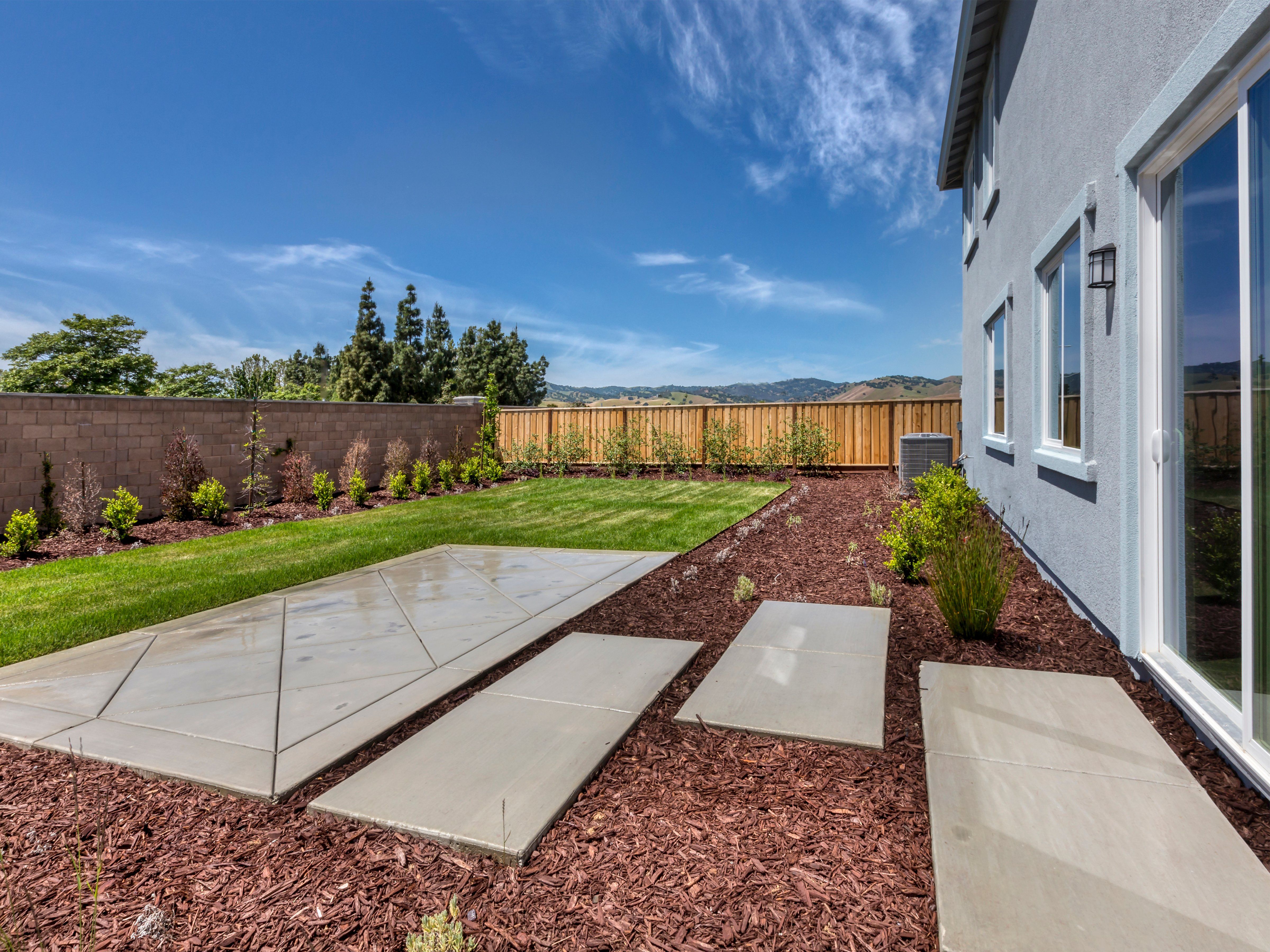 Soak in the California sun in the secluded backyard.