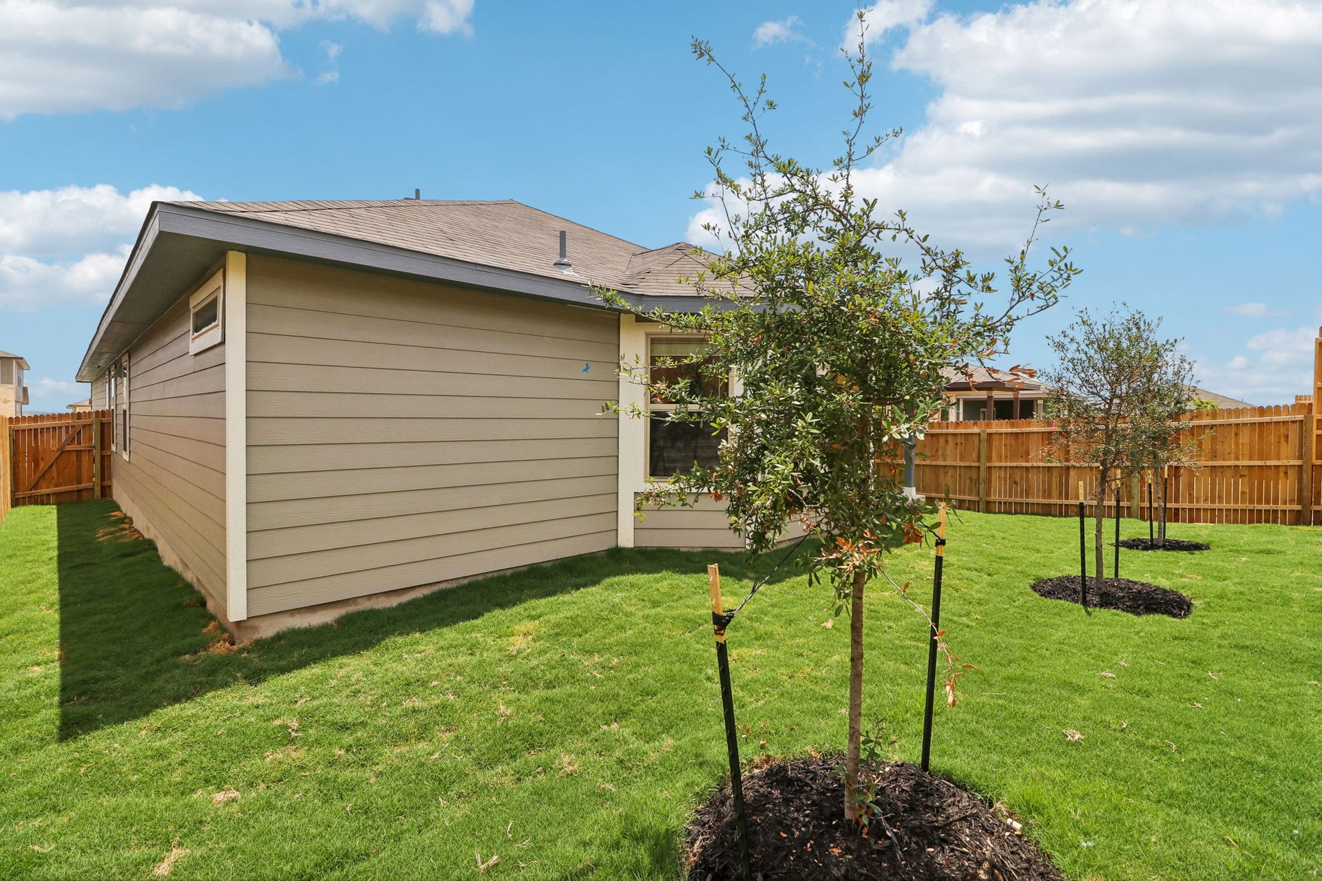 Back exterior of the Hughes floorplan at a Meritage Homes community.