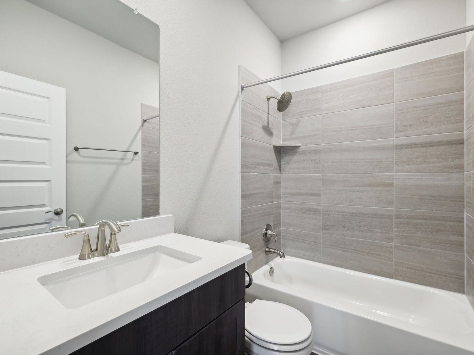 The third secondary bedroom has its own bathroom connected.