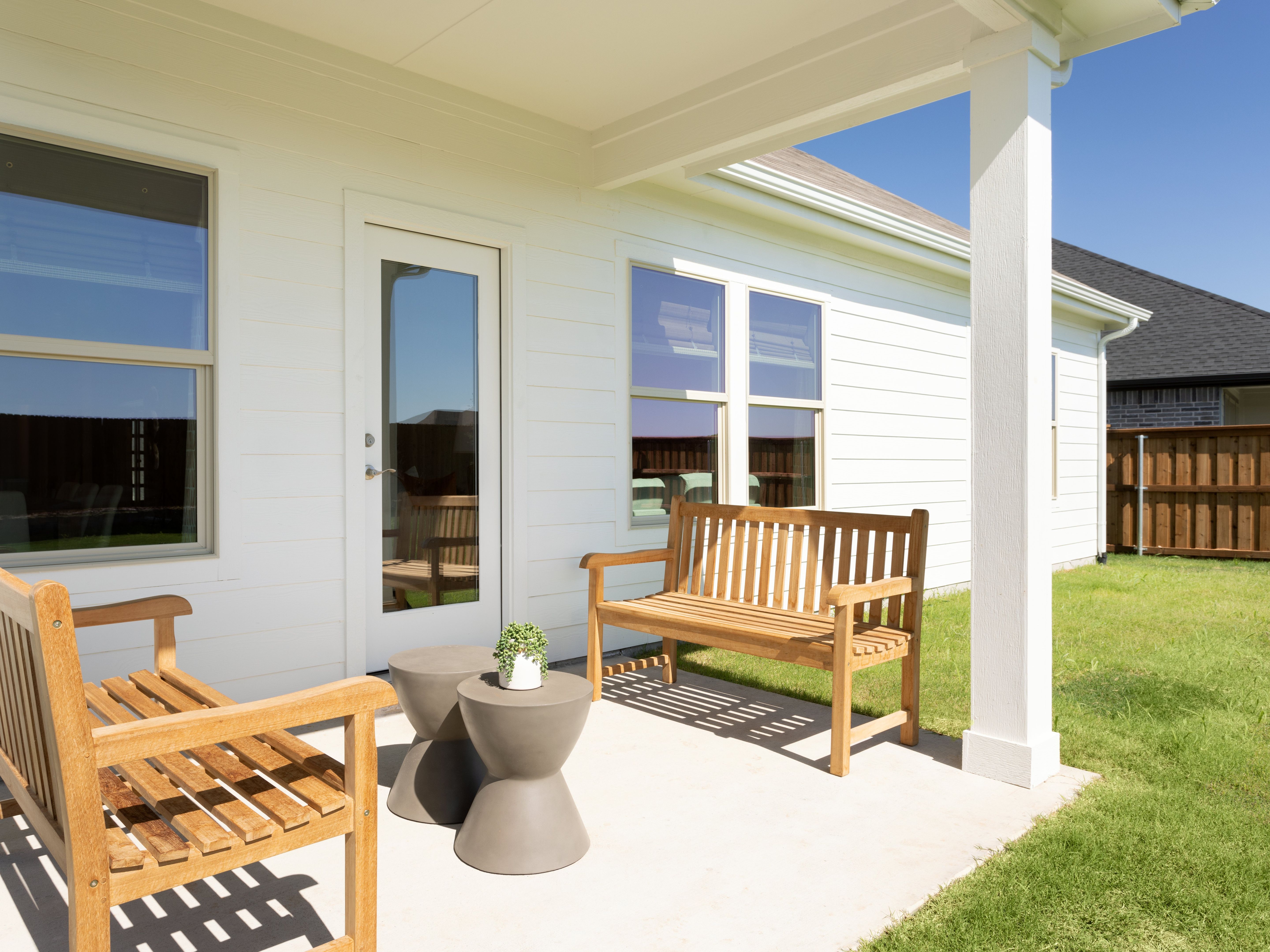Enjoy the outdoors on the back patio of the Kessler