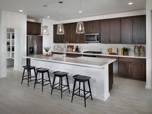Kitchen in Amber Floorplan modeled at The Enclave at Mission Royale
