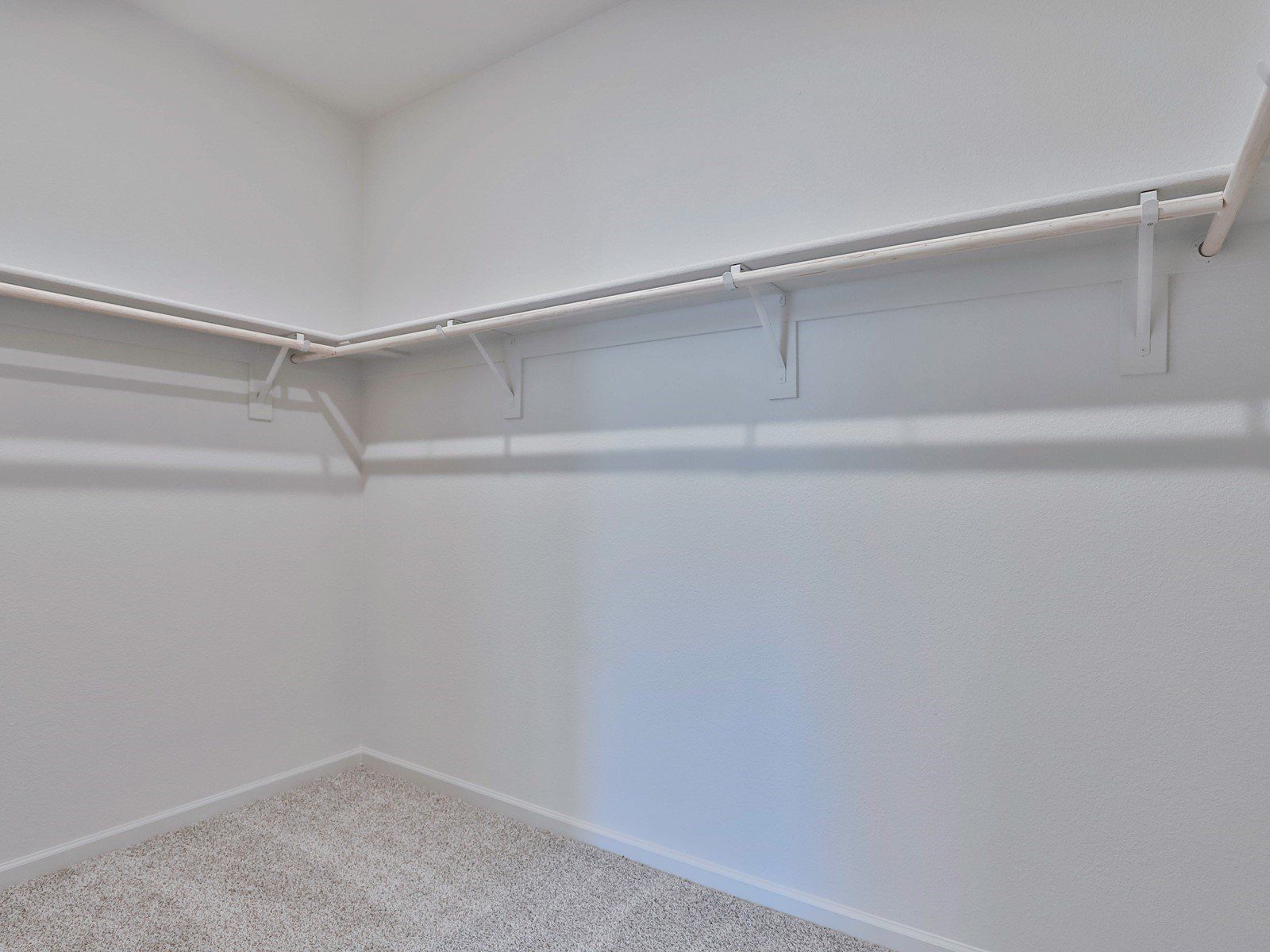 Residence 1 primary walk-in closet at a nearby Meritage community.