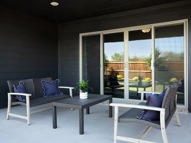 Enjoy the outdoors on the back patio of the Oleander