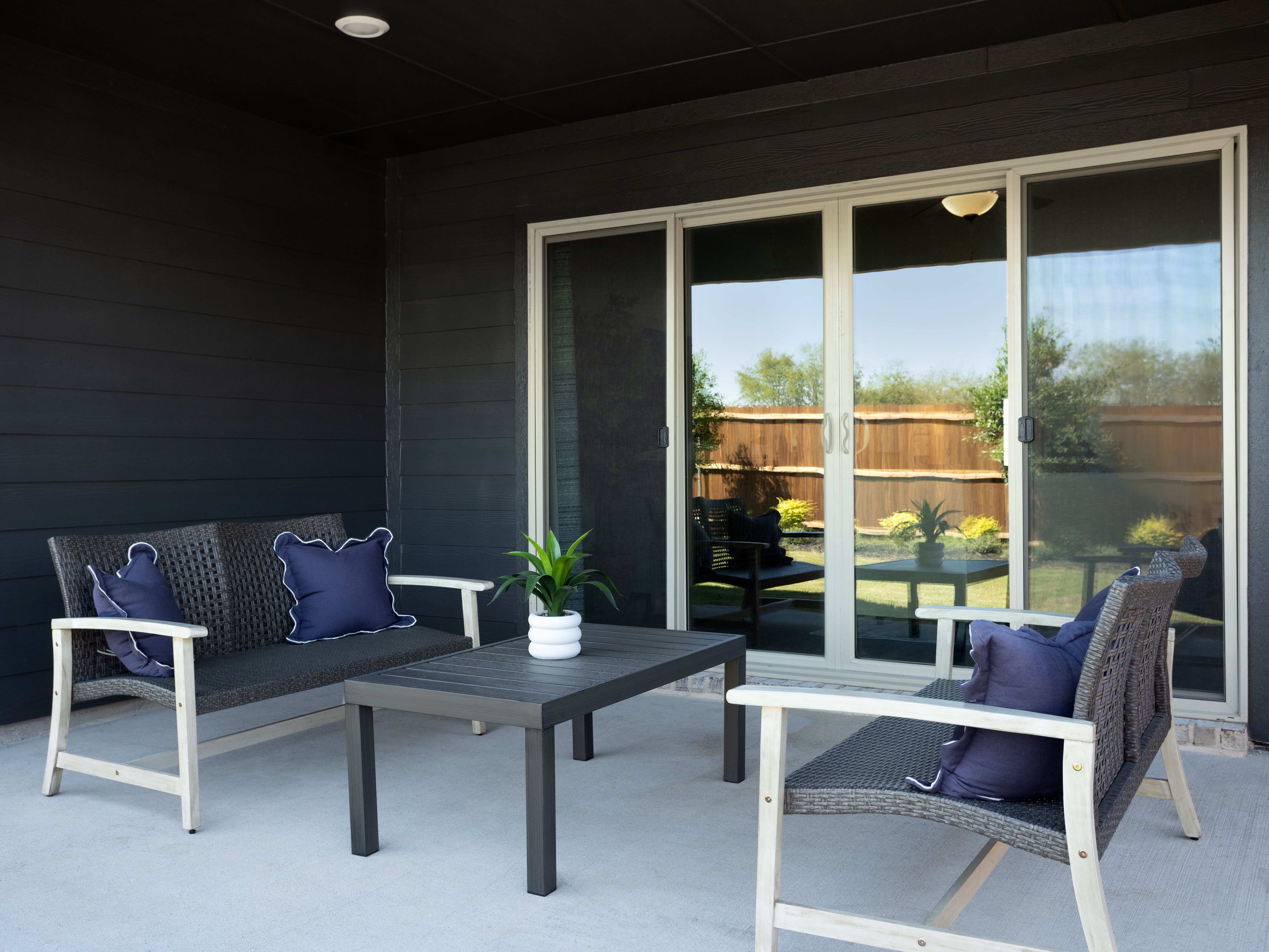 Enjoy the outdoors on the back patio of the Oleander