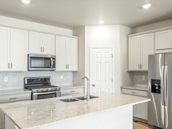 The Byers floorplan interior image taken at a Meritage Homes community in Commerce City, CO.