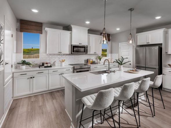 Kitchen in the 2135 floorplan at a Meritage Homes community in San Pedro, CA.