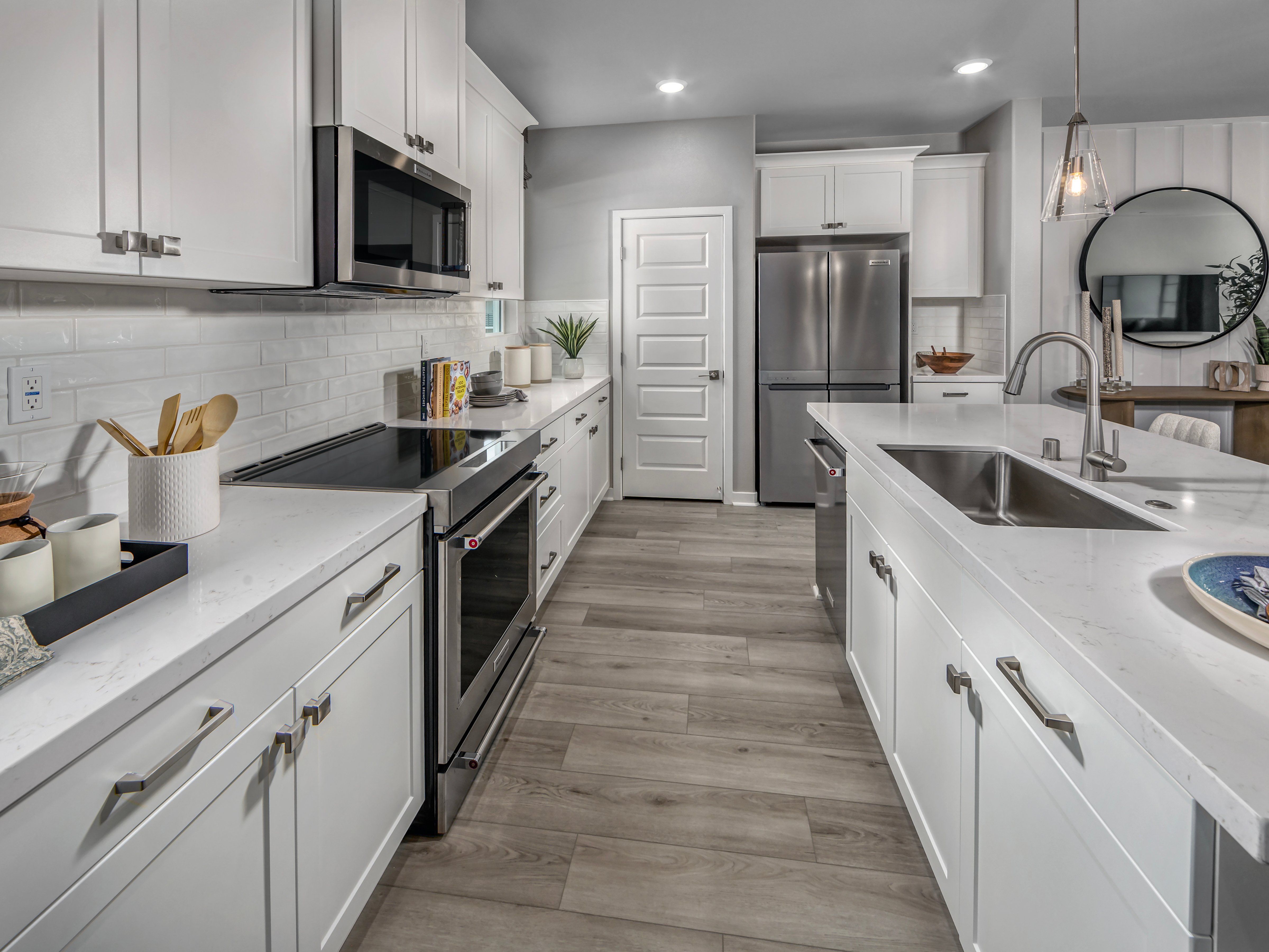 Kitchen in the 2135 floorplan at a Meritage Homes community in San Pedro, CA.