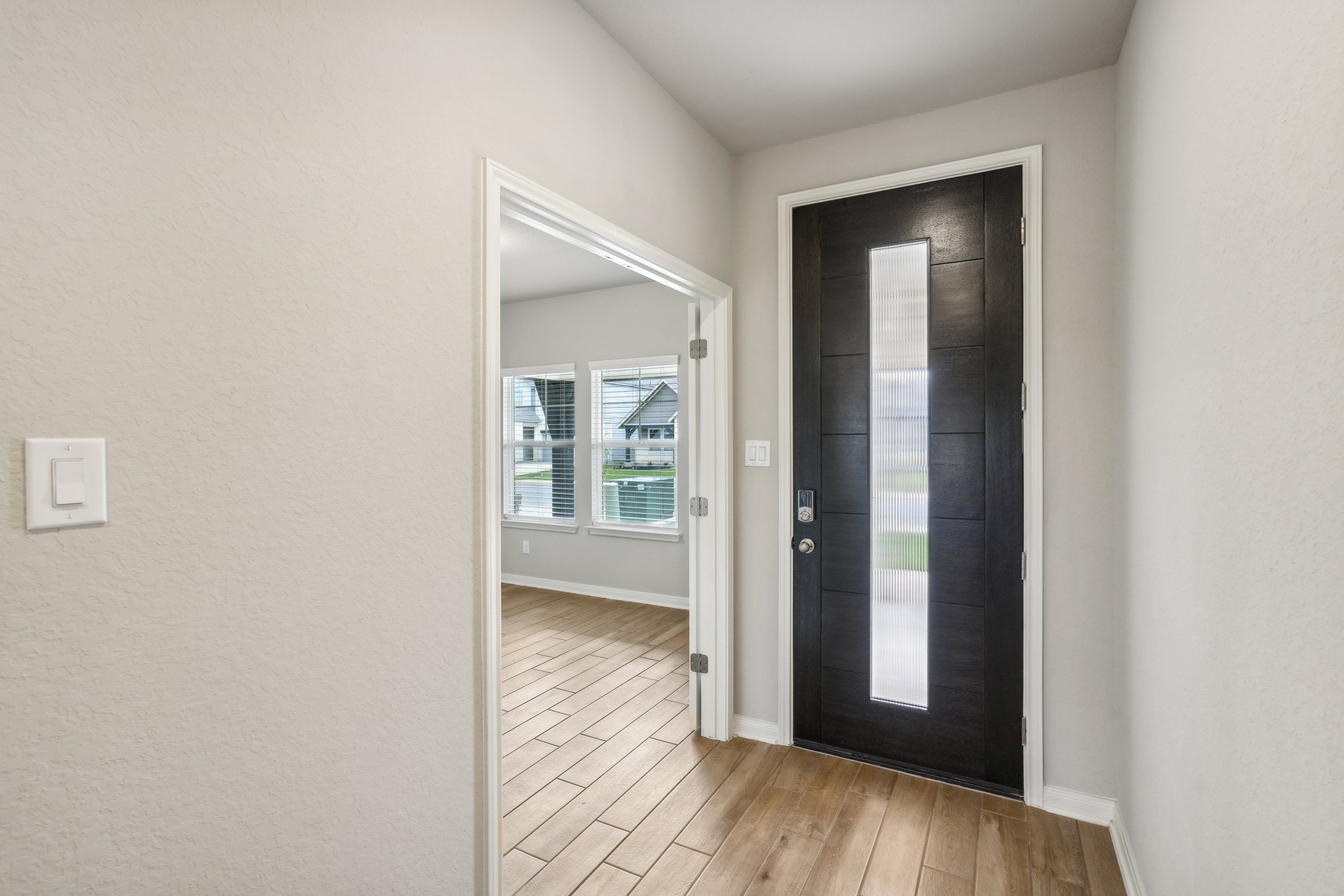 Entry of the Oleander floorplan at a Meritage Homes community.