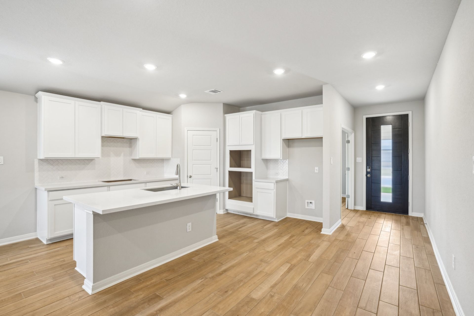 Kitchen in the Oleander floorplan at a Meritage Homes community.
