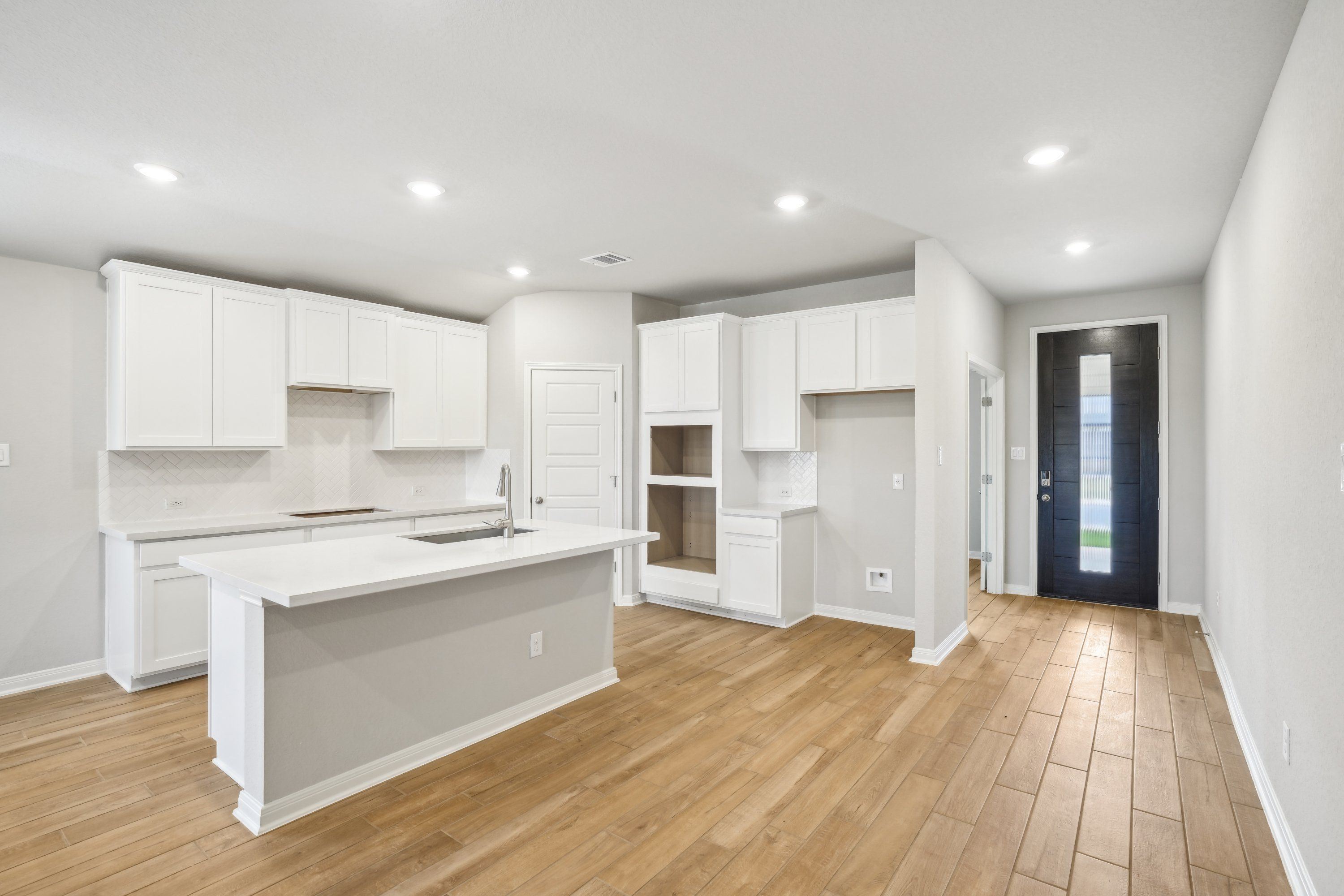 Kitchen in the Oleander floorplan at a Meritage Homes community.