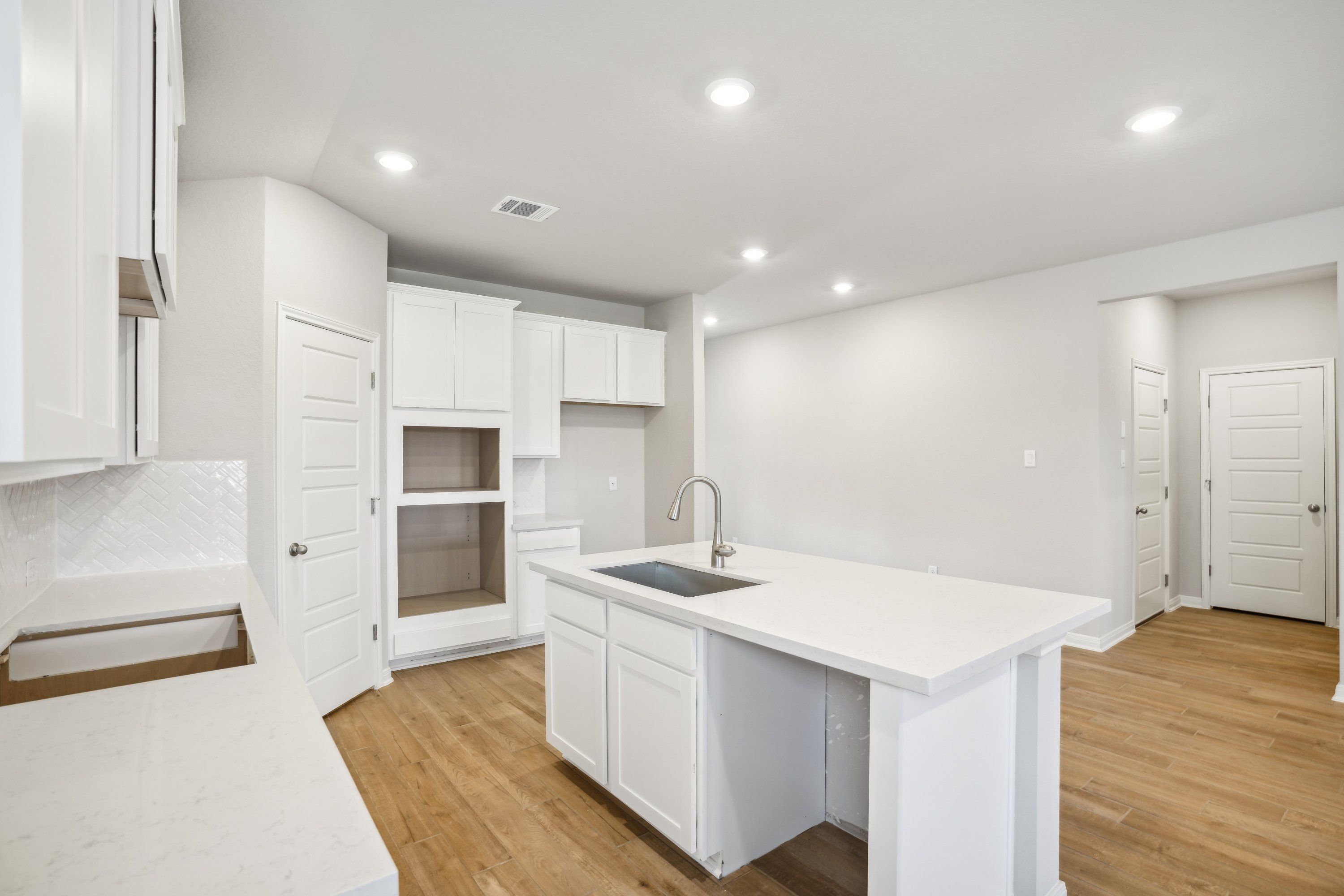 Kitchen in the Oleander floorplan at a Meritage Homes community.