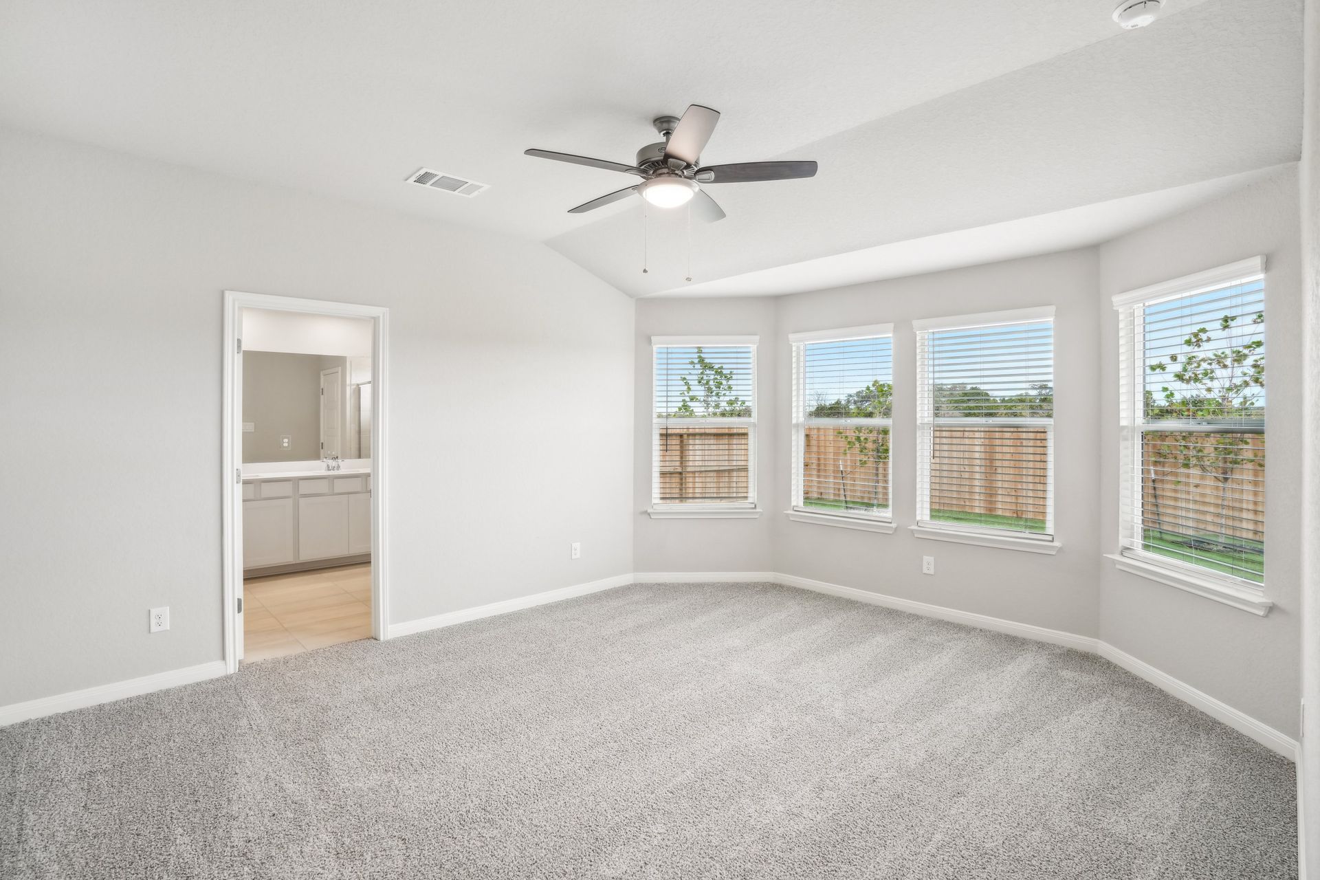 Primary suite in the Oleander floorplan at a Meritage Homes community.
