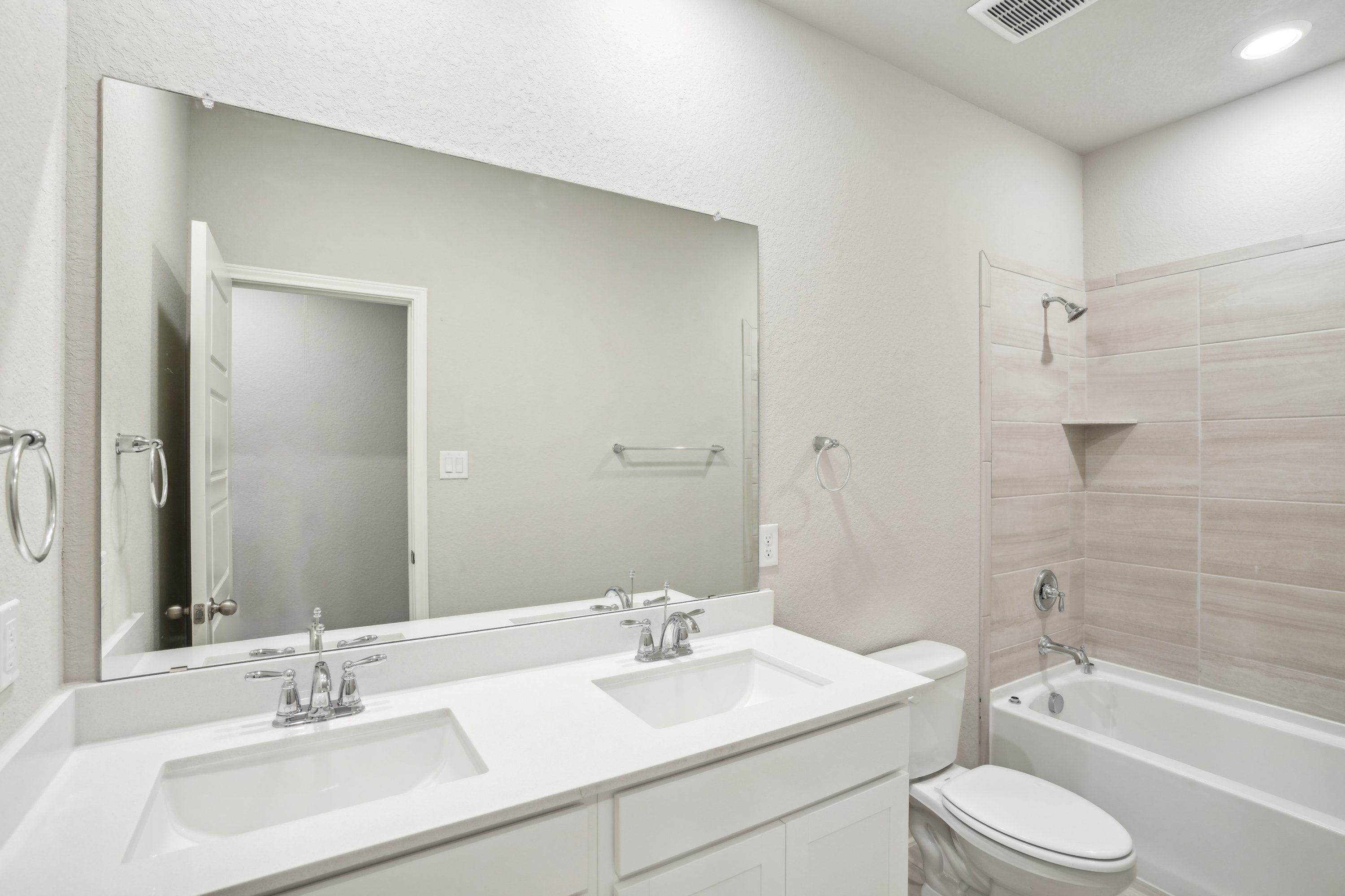 Guest bathroom in the Oleander floorplan at a Meritage Homes community.