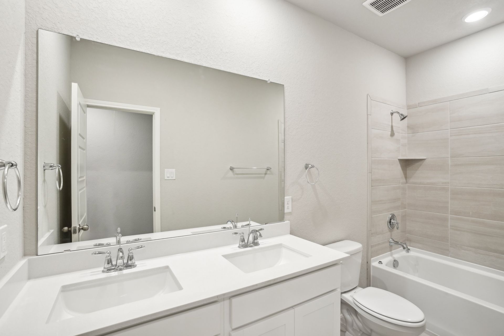 Guest bathroom in the Oleander floorplan at a Meritage Homes community.