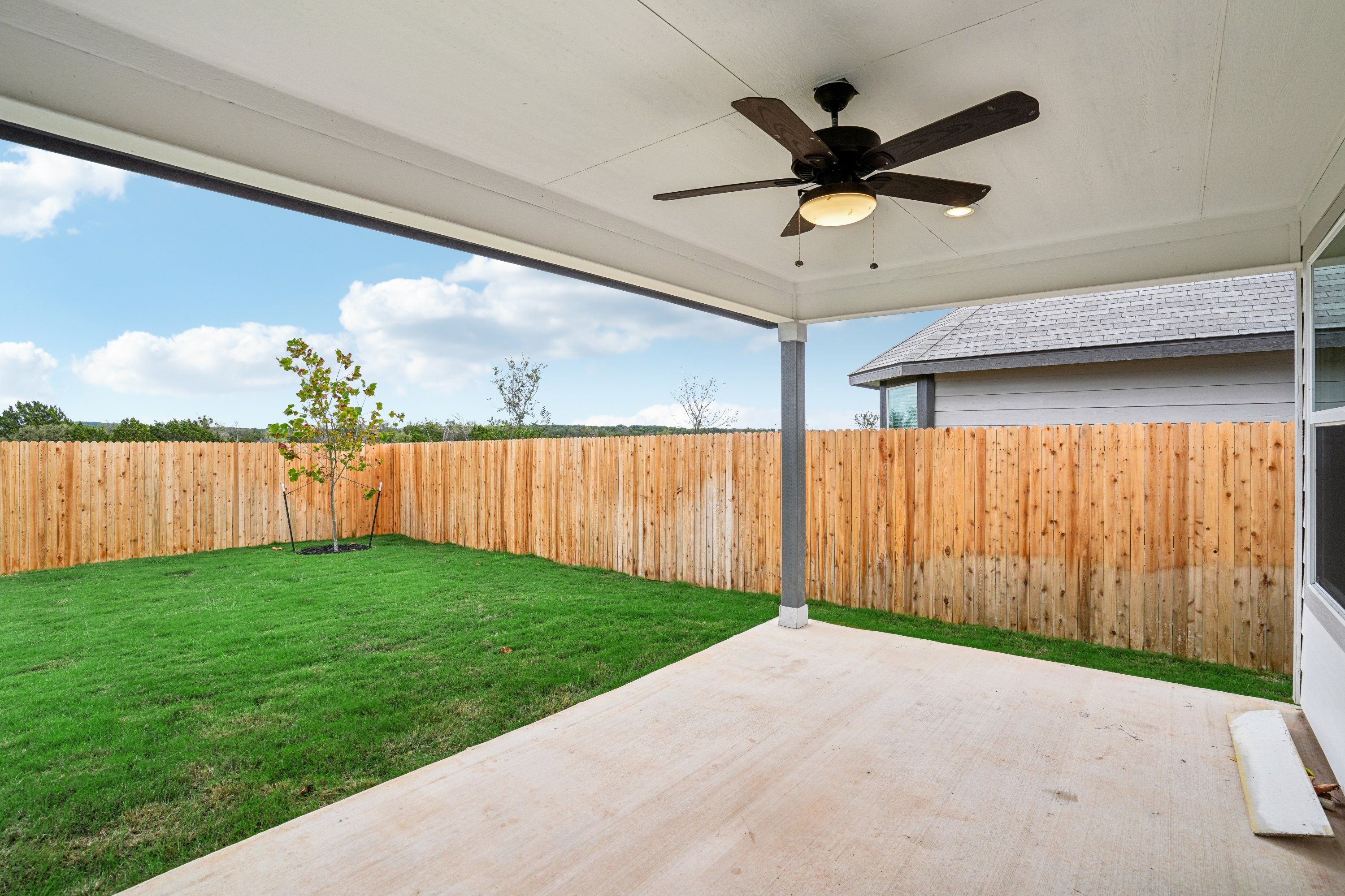 Back exterior of the Oleander floorplan at a Meritage Homes community.
