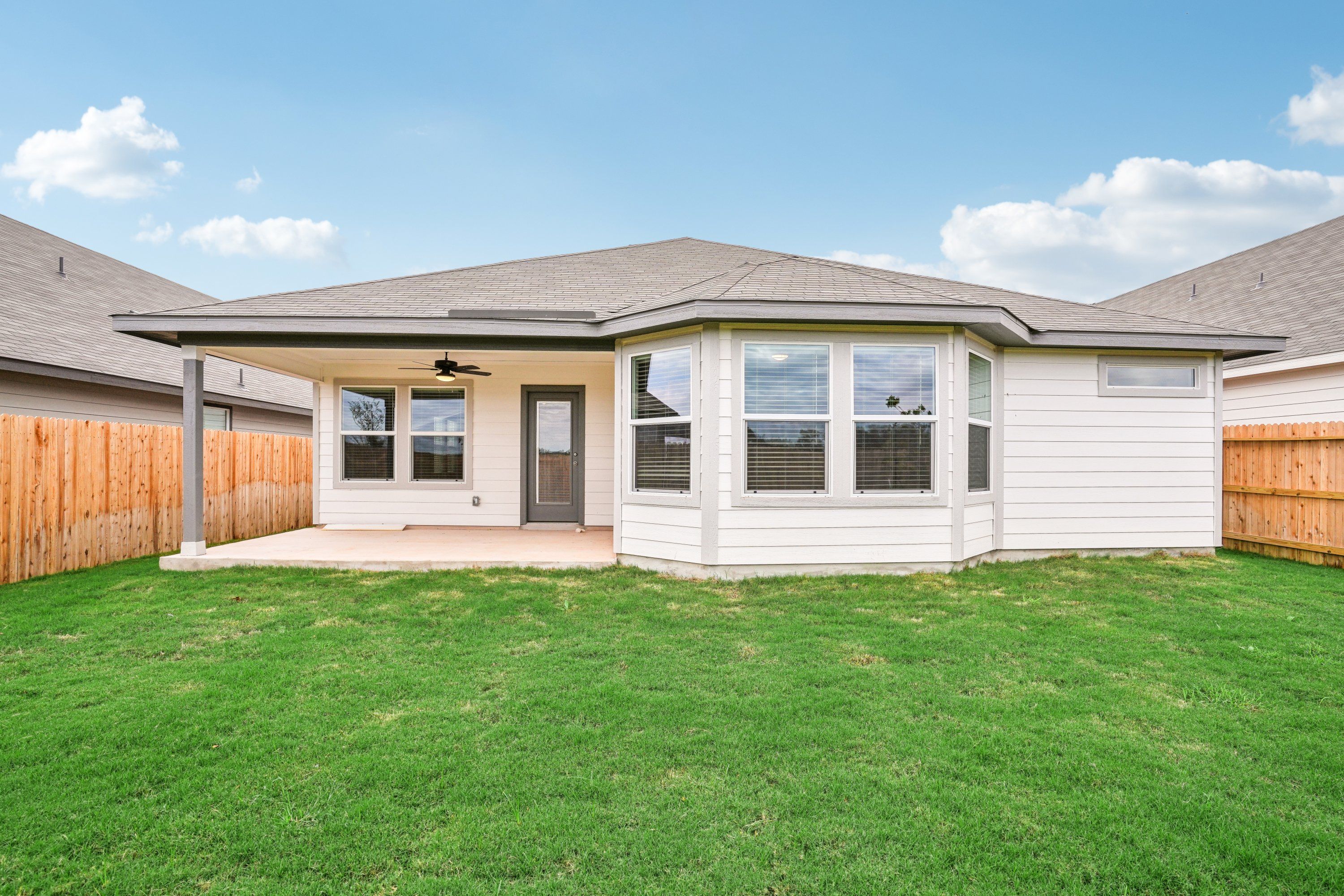Back exterior of the Oleander floorplan at a Meritage Homes community.