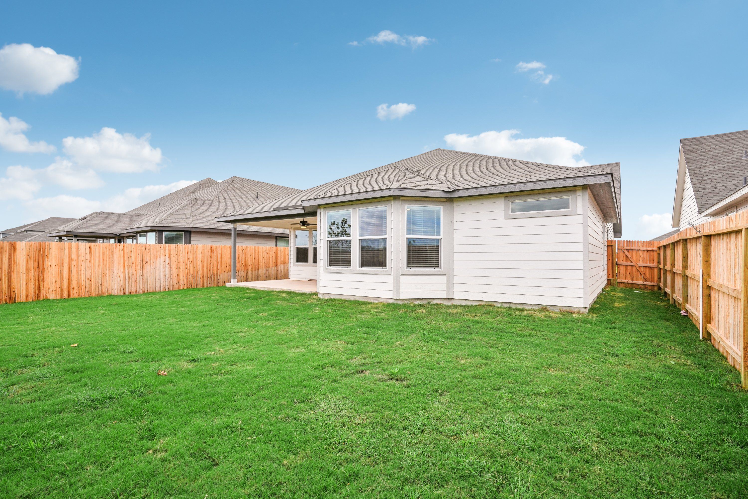 Back exterior of the Oleander floorplan at a Meritage Homes community.