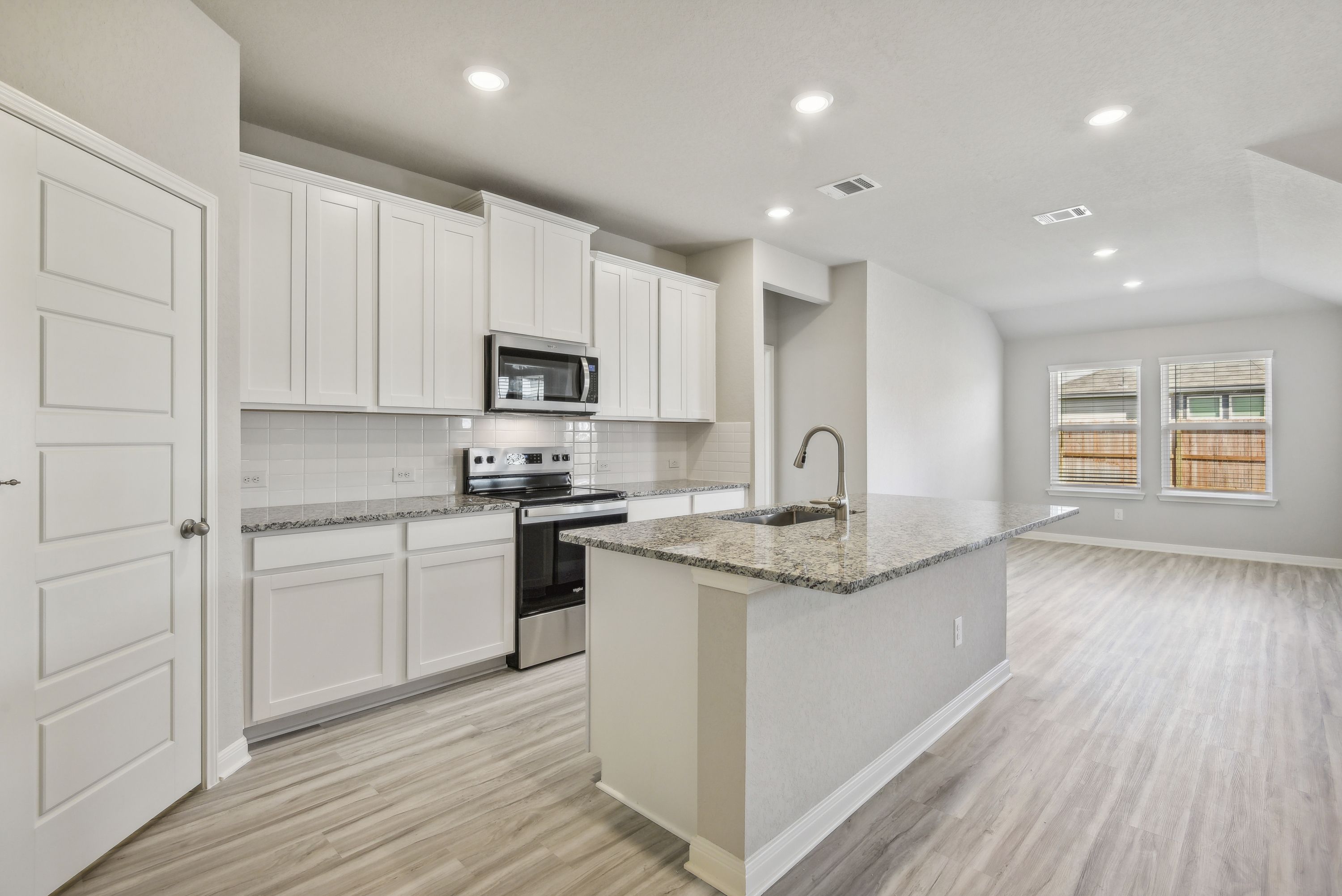 Kitchen in the Callaghan floorplan at a Meritage Homes community.