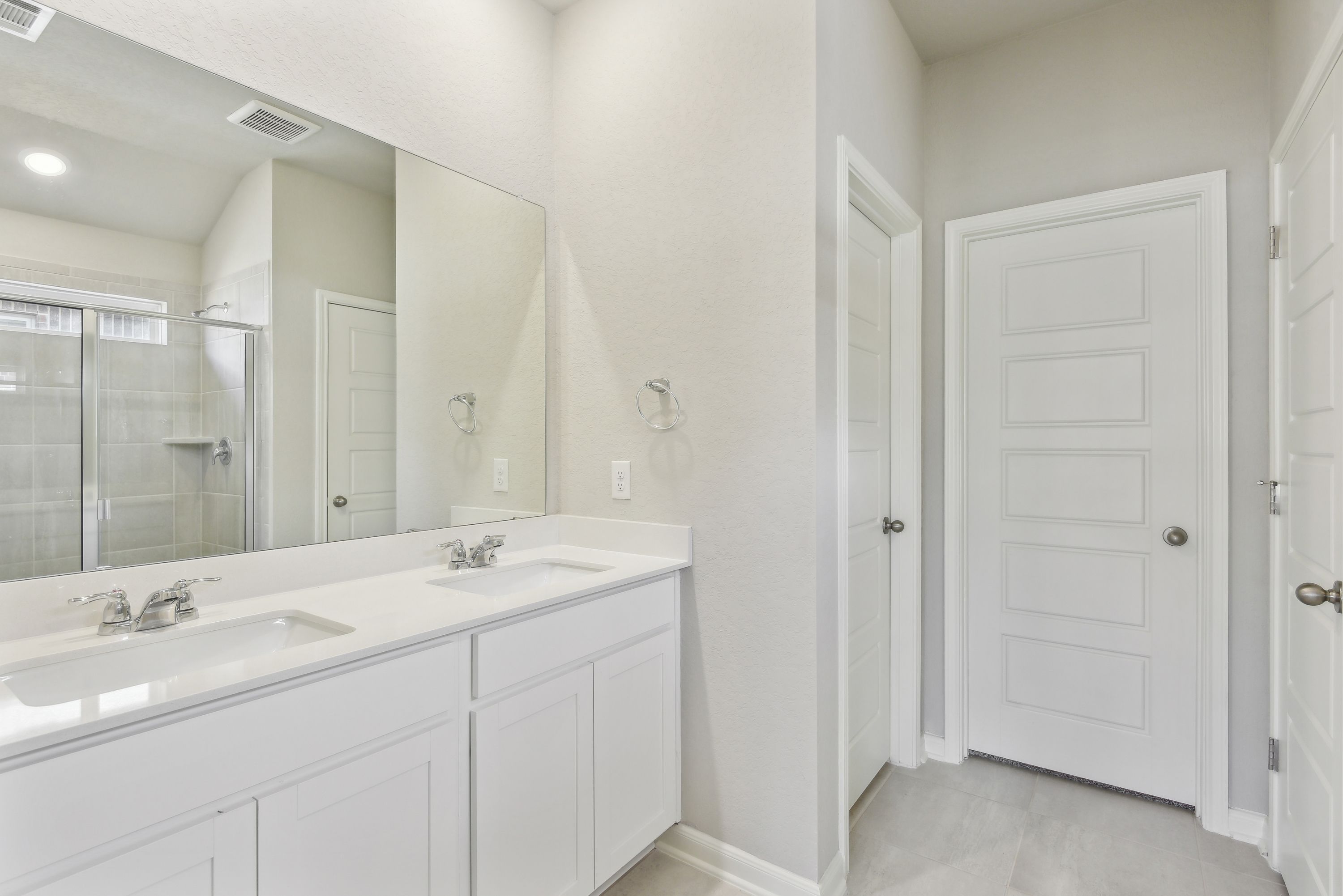 Primary suite bathroom in the Callaghan floorplan at a Meritage Homes community.
