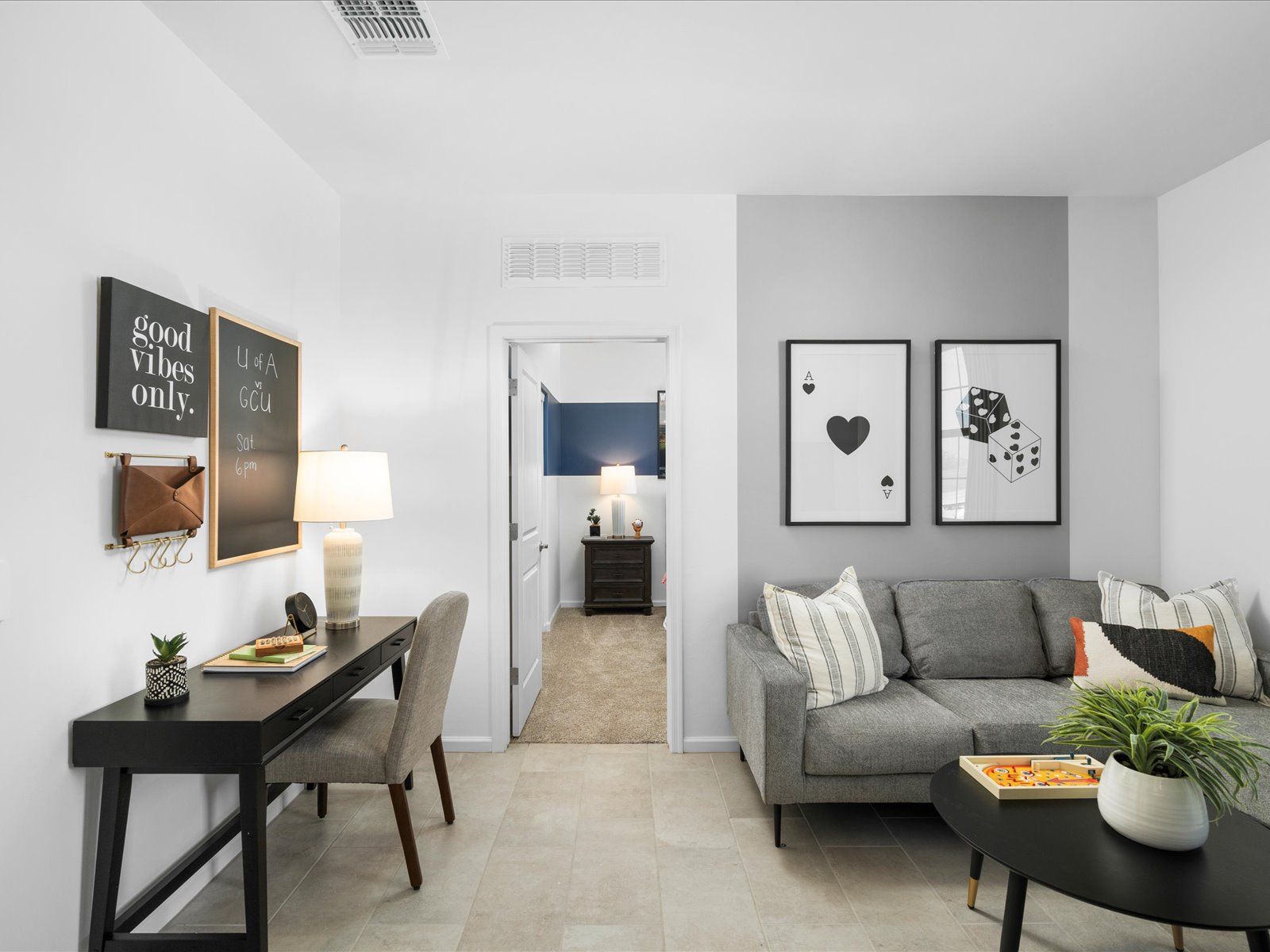The flex space adjoining bedrooms 2 and 3 is a perfect place to work on homework or watch a movie.