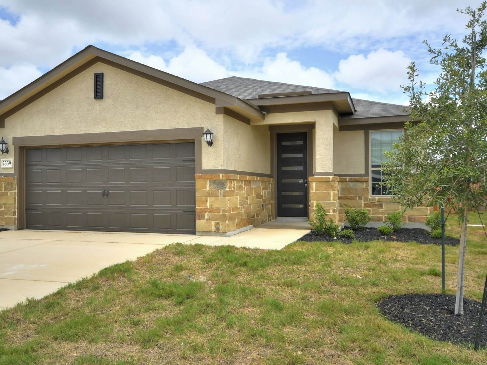 Front exterior of the San Saba floorplan at a Meritage Homes community.