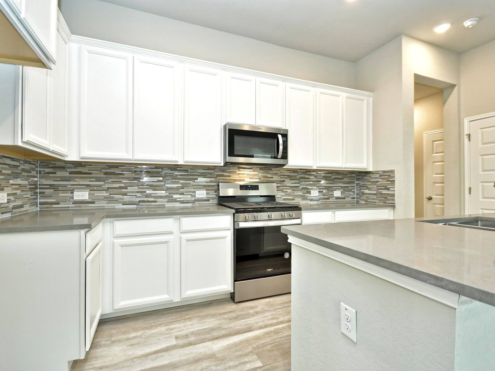 Kitchen in the San Saba floorplan at a Meritage Homes community.