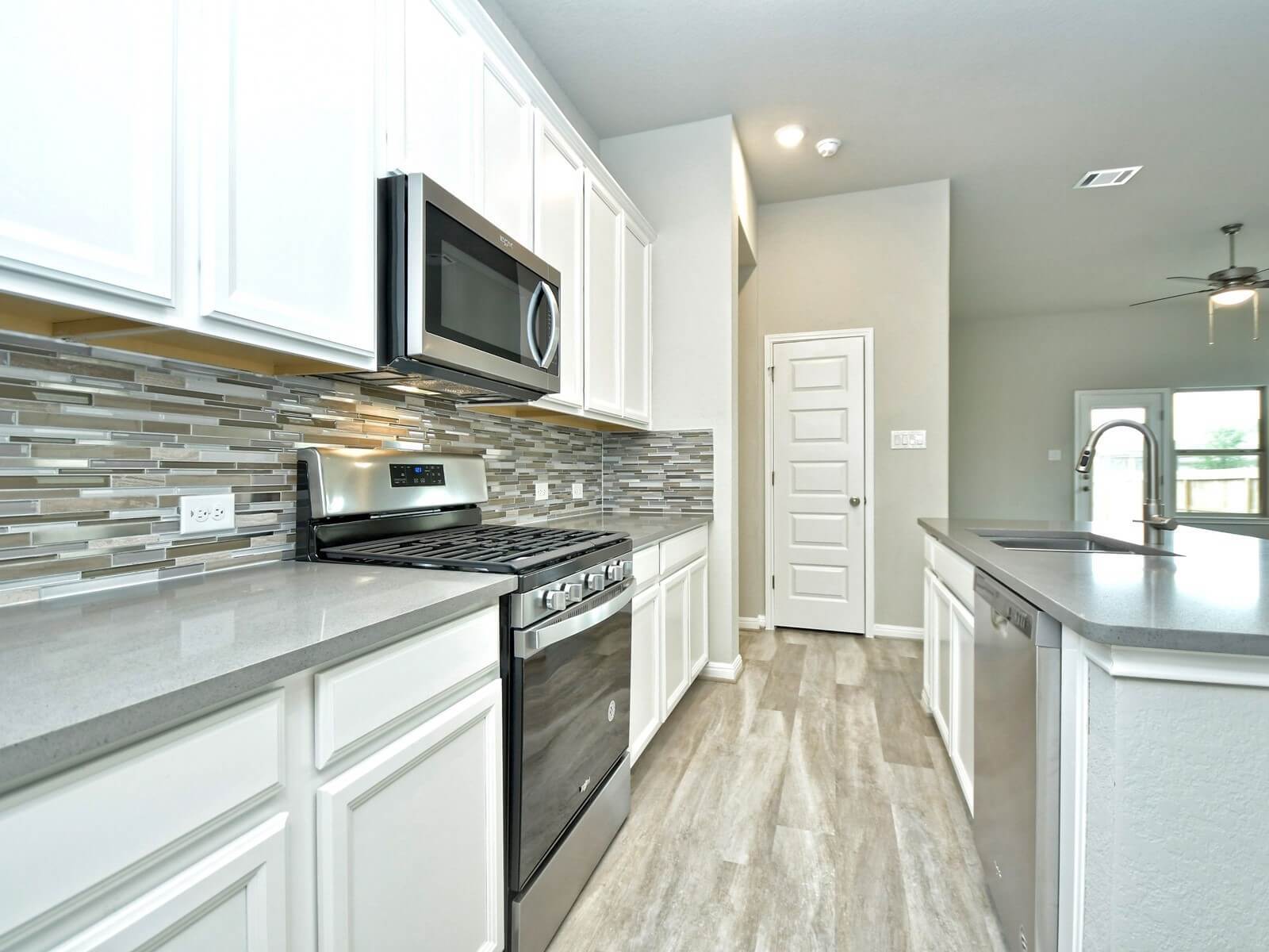 Kitchen in the San Saba floorplan at a Meritage Homes community.