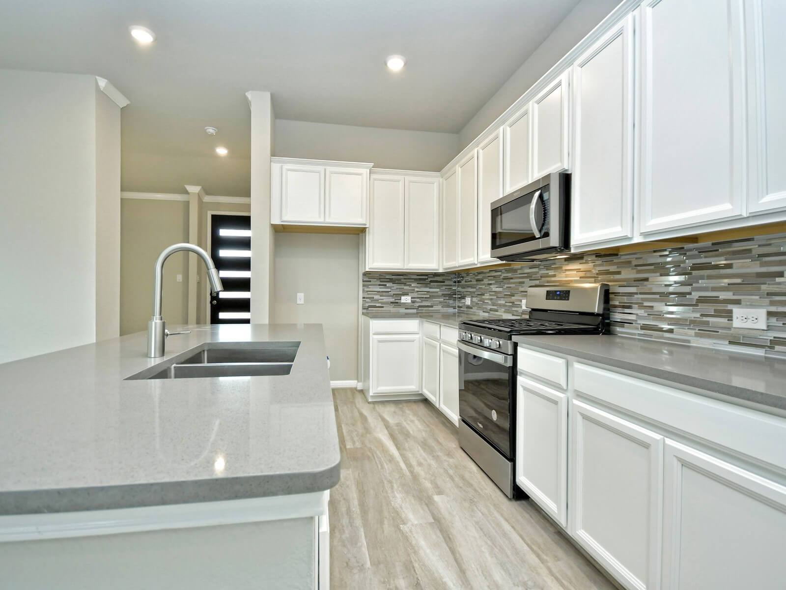 Kitchen in the San Saba floorplan at a Meritage Homes community.